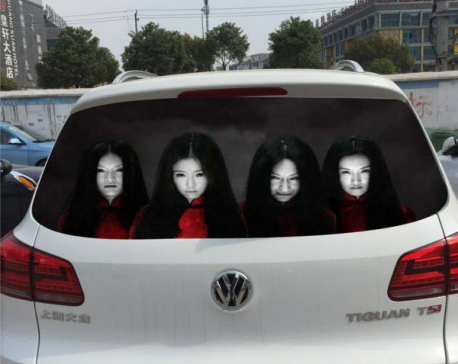 Chinese drivers try to deter nighttime high-beam use with scary decals